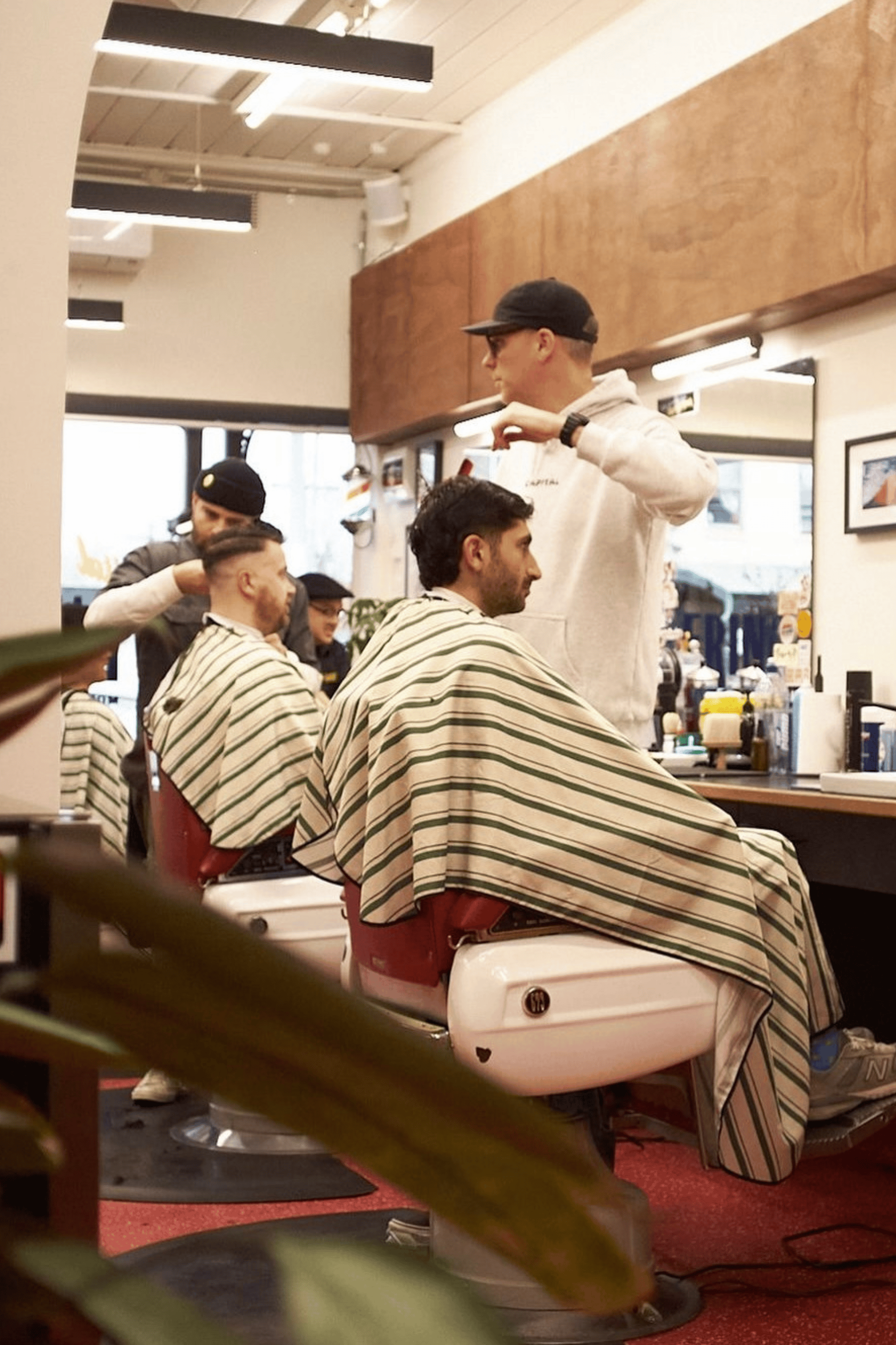 evergreen striped barber capes in Capital Barbers in australia